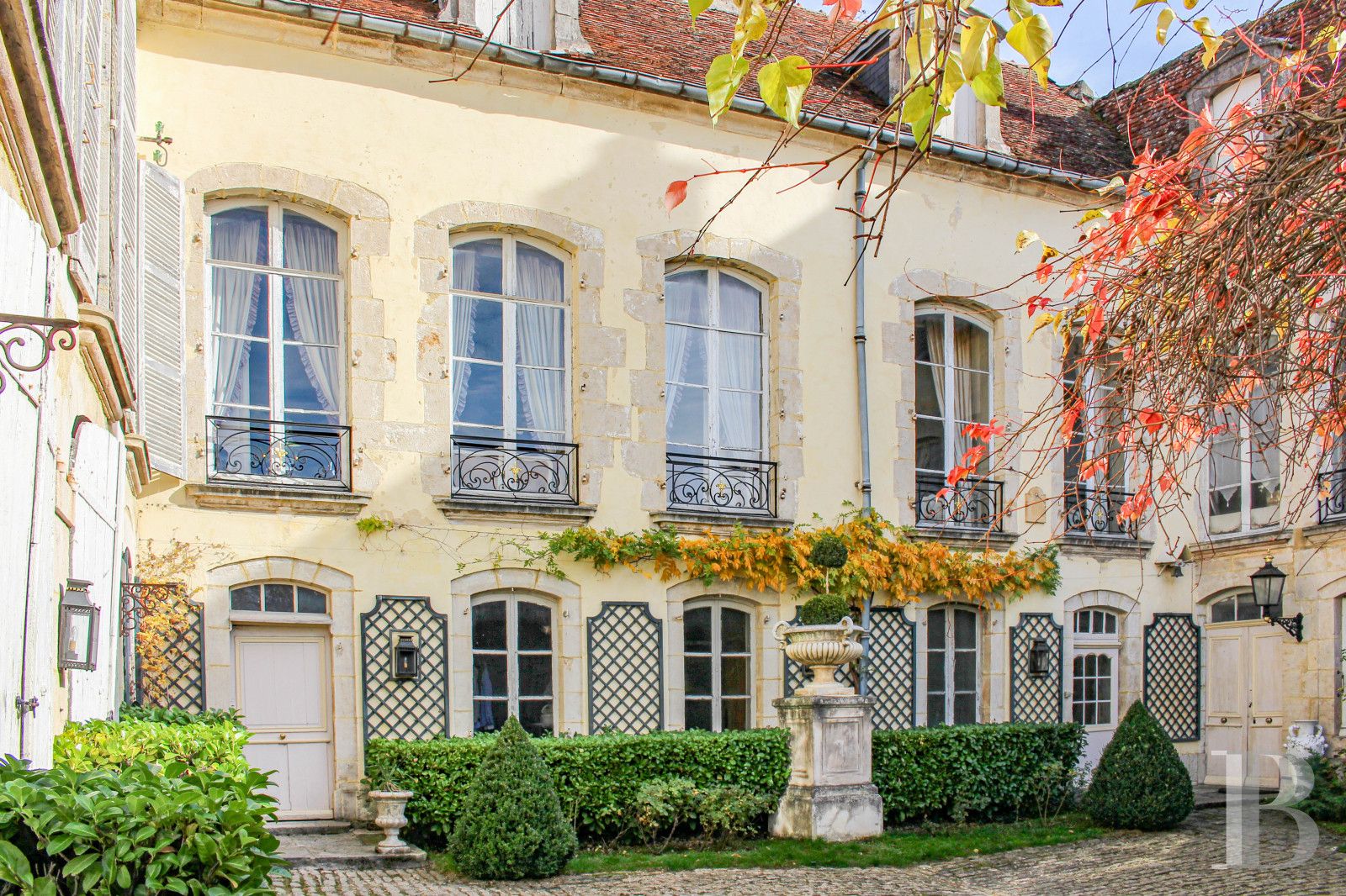 A listed, 18th century mansion house, marked by the Napoleon era, in a