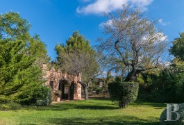 An old mill, transformed into a luxury villa, with a swimming pool  and an exotic garden, near to the village of Santa-Eugènia