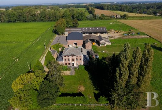 An elegant farmhouse with its 42-ha estate  in the area around Namur, in the Condroz region