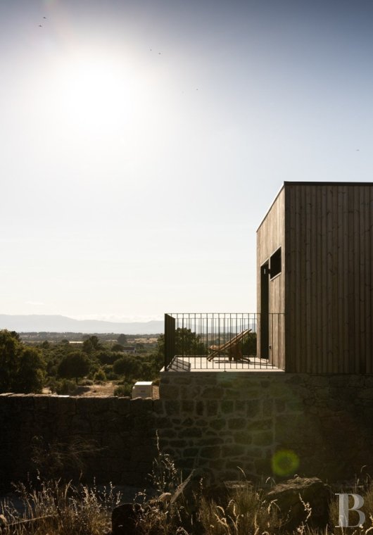 A renovated property with several dwellings that have interiors inspired by<br/>wabi sabi style, nestled high up in a 12th-century Portuguese village