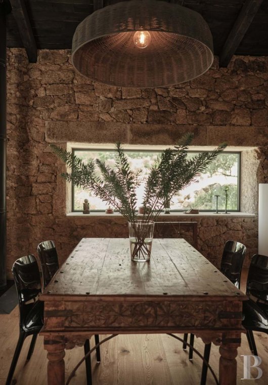 A renovated property with several dwellings that have interiors inspired by<br/>wabi sabi style, nestled high up in a 12th-century Portuguese village
