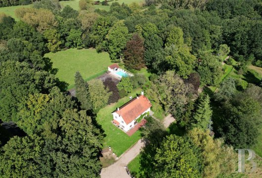 A rural property with a swimming pool, tennis court and 6.5 hectares of grounds, nestled in Belgium’s Flemish Brabant province