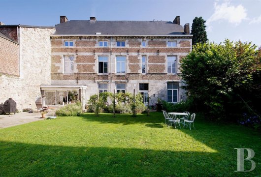 A 16th-century townhouse with a lush garden and a magnificent view of  a collegiate church, nestled between the cities of ...