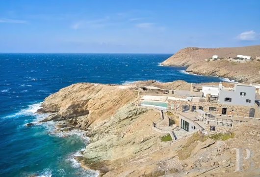 On the Aegean coast, a villa perched on a cliff with a private path to the shore