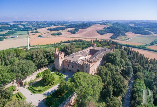 Between Florence and Siena, a 15th-century Tuscan fortress, with 1,200 hectares of vineyards and olive groves