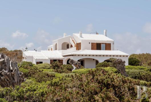 In Cala Morell, on the northwest coast of Menorca, a 478-square-meter villa on approximately 4,000 square meters ...
