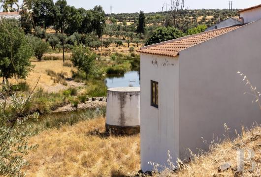 In the Southwest Alentejo Natural Park, a property in need of renovation on a hill with views of the Atlantic Ocean