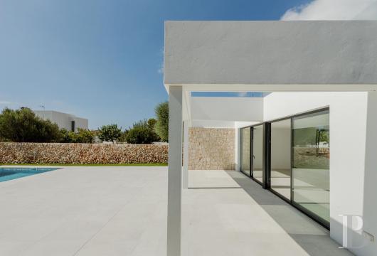 In Menorca, in Sa Caleta, on the outskirts of Ciutadella, a new south-facing villa set on a plot of around 830 ...