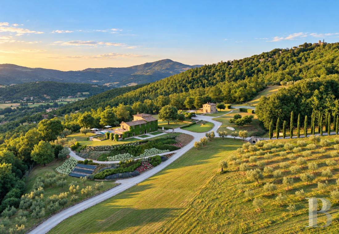 In Umbria, on the border with Tuscany, in the Niccone Valley,<br/>an old farmhouse, with its tower, guest houses and olive groves, set in grounds covering some 17.8 hectares